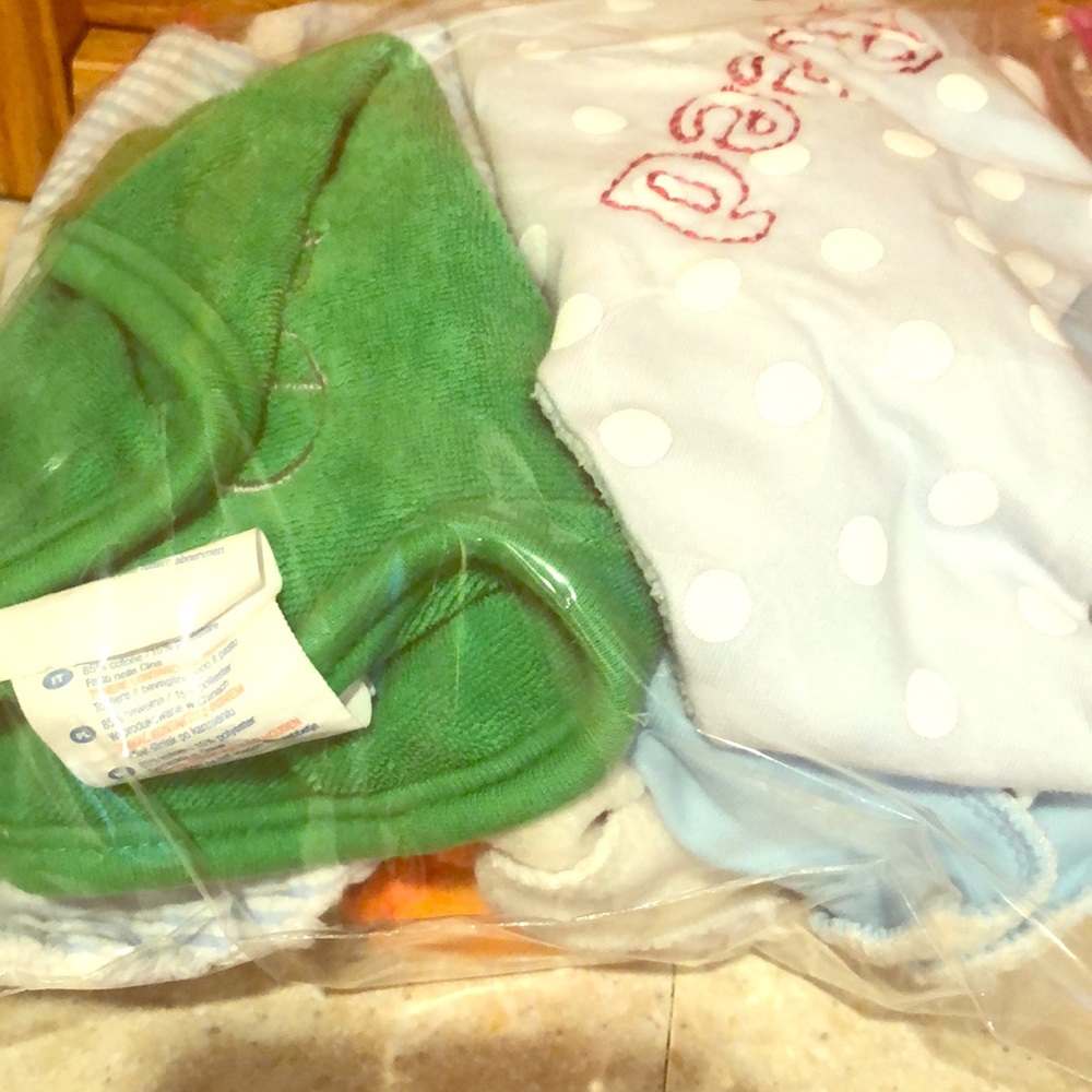 Multiple monogram baby bibs. Reed monogram